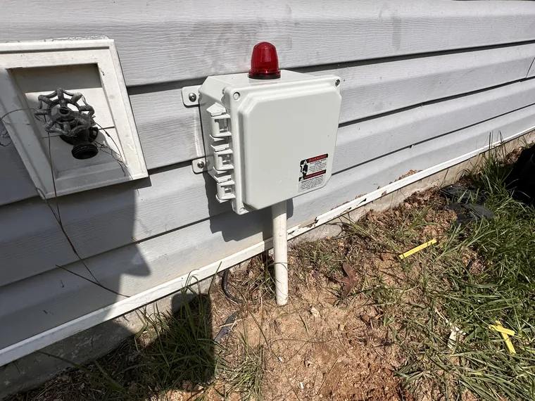 Weather-tight septic alarm panel install by SepticRooter™ in Chattanooga & Southeast Tennessee, GA