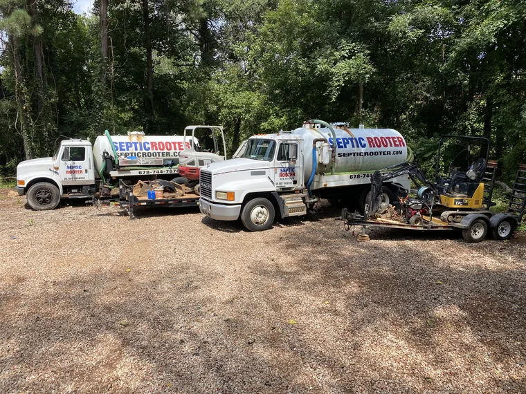 Multiple SepticRooter pump trucks and equipment staged for Chattanooga calls